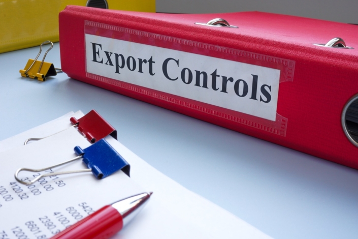 Accounting documents and a folder labeled export controls. Financial regulation and sanctions.